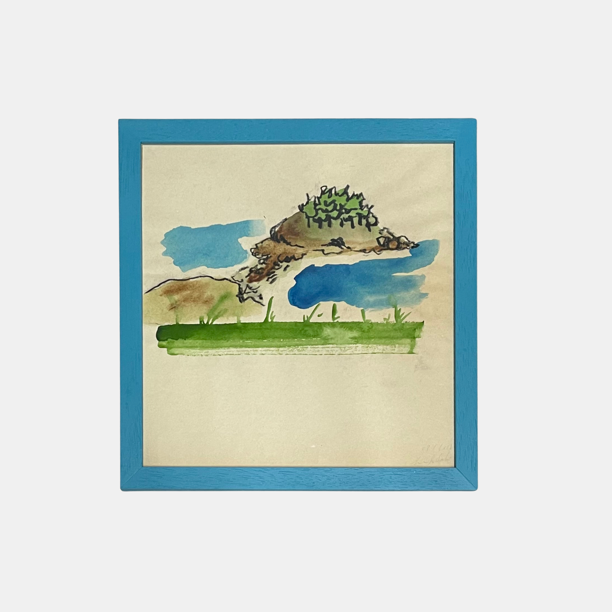 Framed artwork of a landscape with a blue border